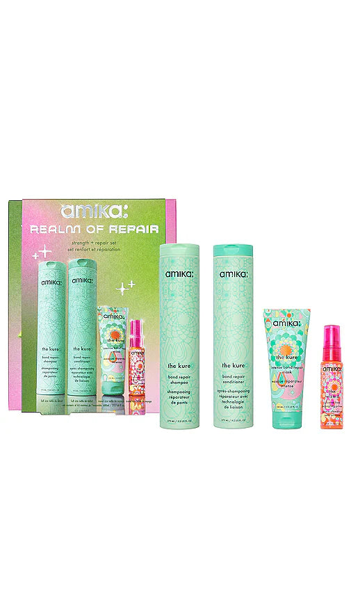 Amika Realm of Repair kit featuring green, pink, and orange packaging