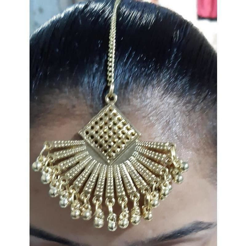 Gold-polished bridal chandbali Maang Tikka with intricate hanging drops and danglers