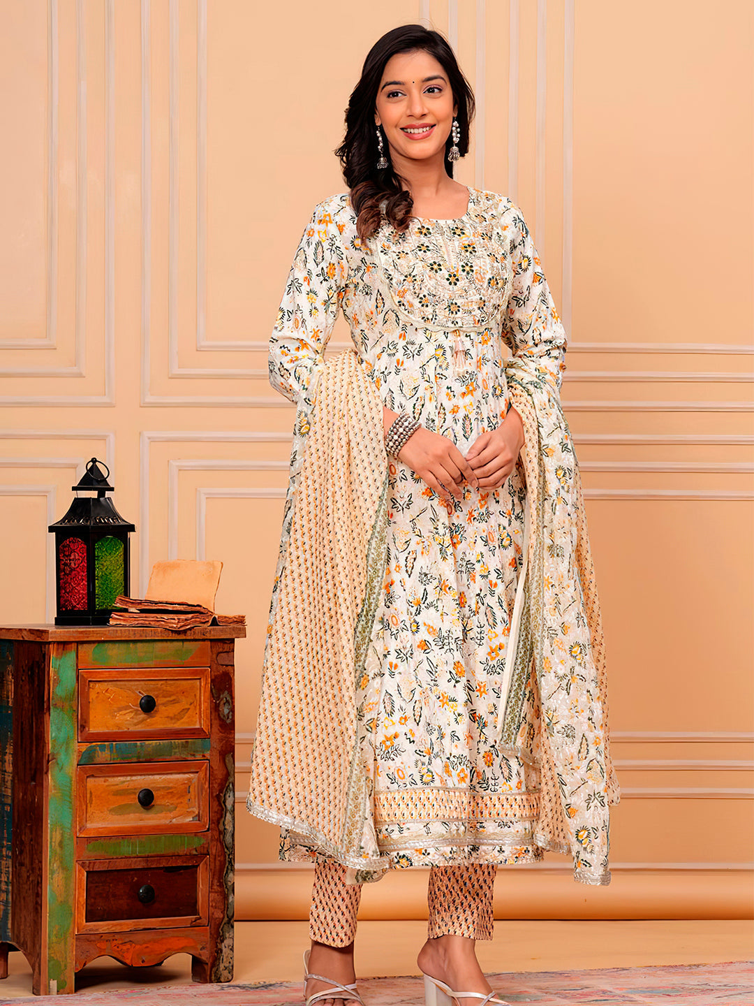 Yellow botanical printed flared kurta set in premium cotton with matching pants and dupatta