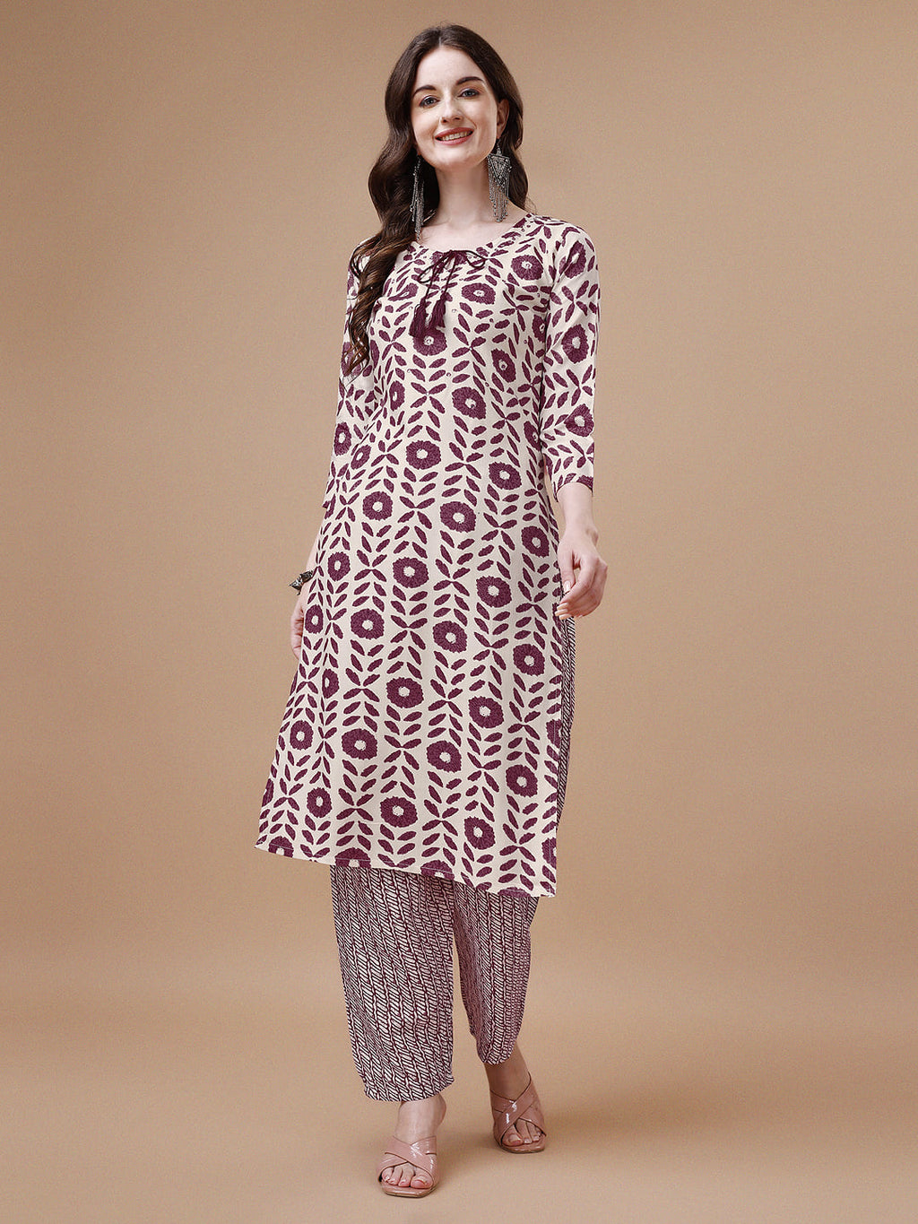 Multicolor printed kurta and matching pant set with tassel tie-up neck detail
