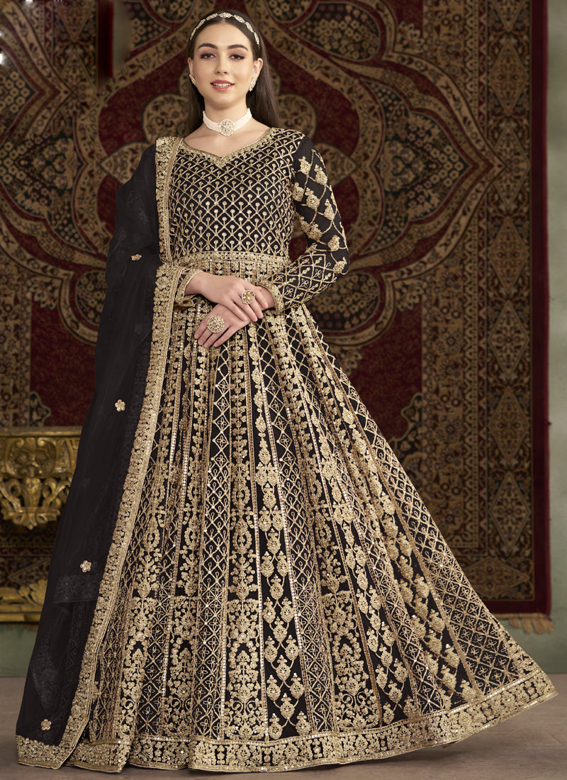 Dark brown net Anarkali suit featuring exquisite embroidery and gota patti
