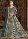 Aqua Blue Net Anarkali suit with delicate embroidery and festive styling.
