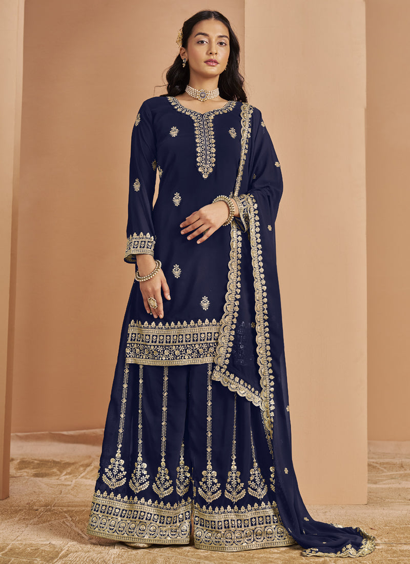 Navy blue faux georgette palazzo suit with intricate embroidery and gota patti