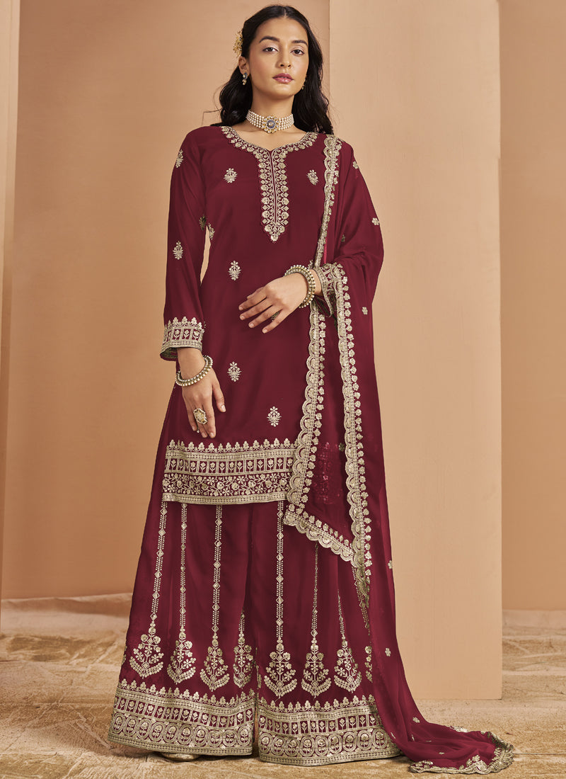 Maroon faux georgette palazzo suit with detailed embroidery and gota patti