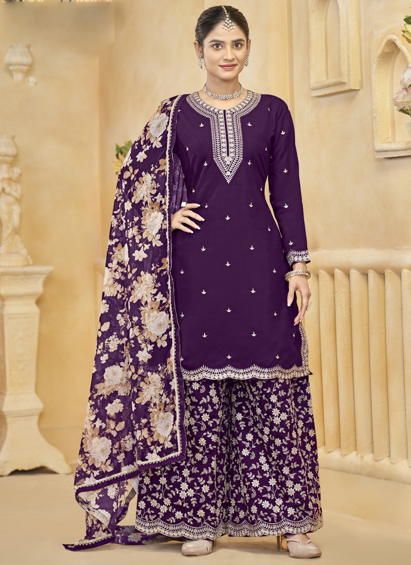 Woman wearing a deep violet Roman silk palazzo suit with gold floral embroidery and matching dupatta.