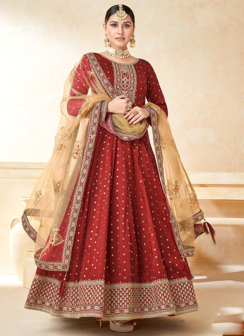 Red taffeta silk Anarkali suit with heavy embroidery and matching dupatta
