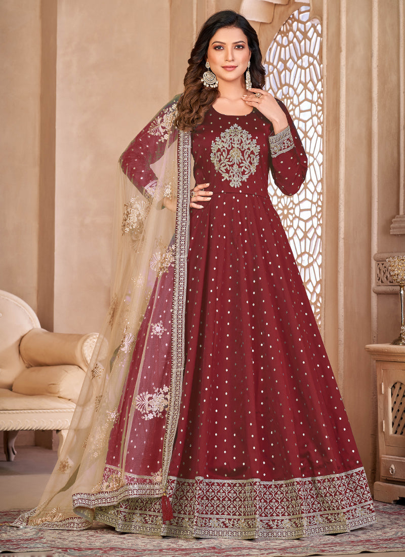 Close up of Maroon Taffeta Silk Anarkali Kurta featuring detailed gold embroidery.
