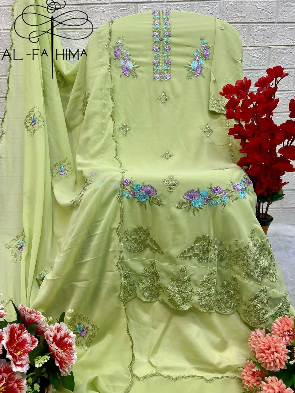Pista Green Georgette Kurta Set with Heavy Embroidery & Moti Work