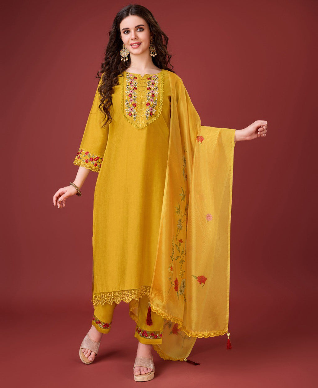 Vibrant yellow Viscose Silk kurta set featuring detailed embroidery