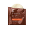 Dr. Dennis Gross Advanced Retinol + Ferulic Perfectly Dosed Treatment pads in brown and orange packaging.