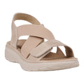 Women's Ariel flat sandals in nude featuring crisscross elastic straps and leather construction