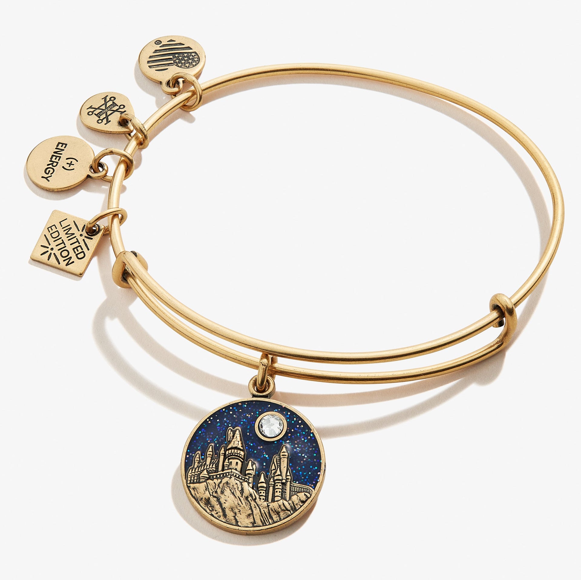 Harry Potter Hogwarts Castle charm bangle in gold and navy blue finish on a display card.