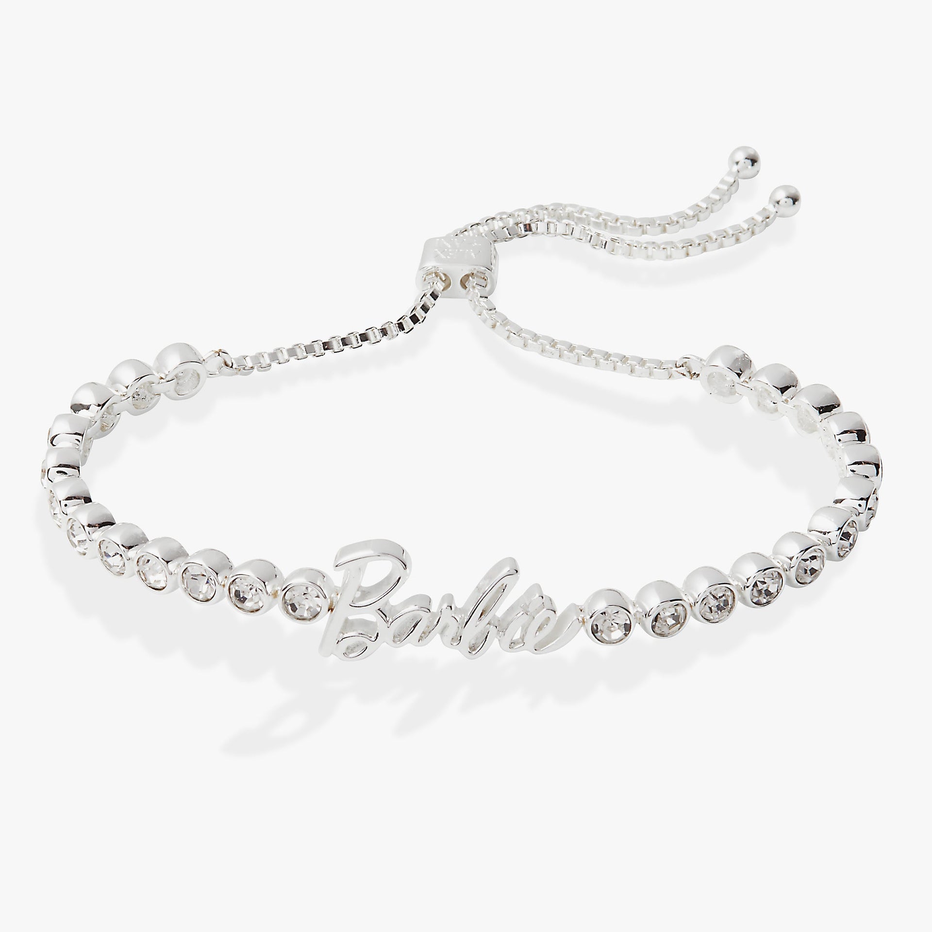 Silver-tone Barbie tennis bracelet featuring pave crystals and an adjustable bolo clasp.