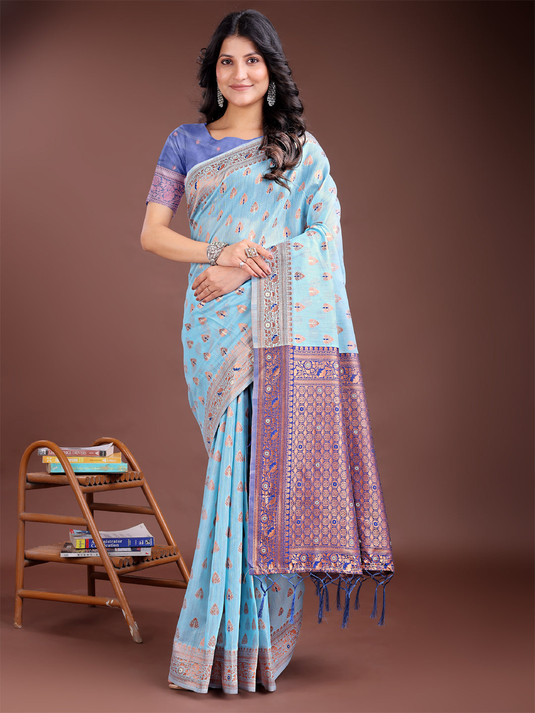 Sky blue cotton saree with contrast pallu and delicate buta motifs