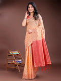 Elegant orange cotton saree featuring subtle buta work and a contrasting royal pallu.