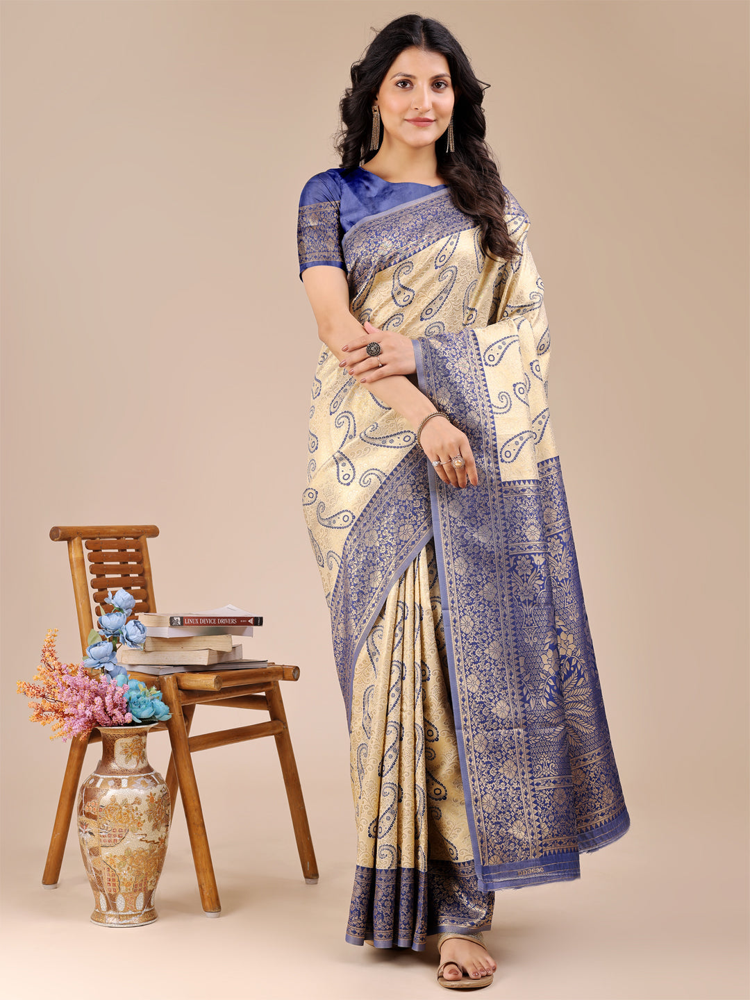 Cream and navy blue Banarasi silk saree with gold zari woven work and tassel fringe