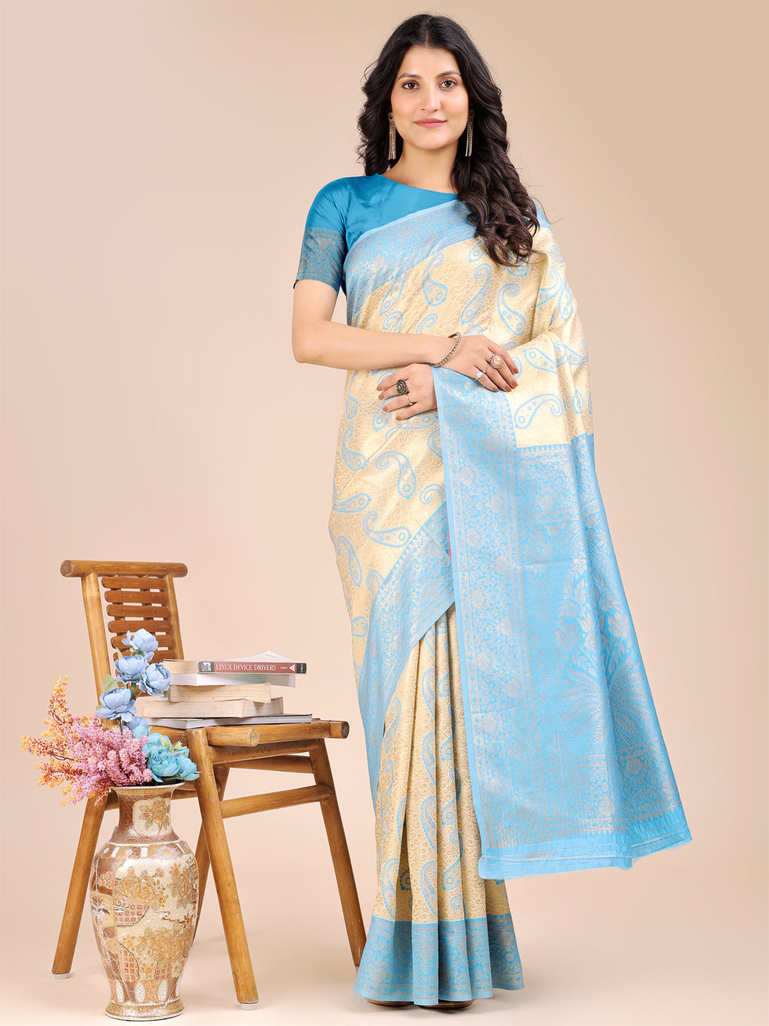 Cream and sky blue Banarasi silk saree with intricate gold zari woven details