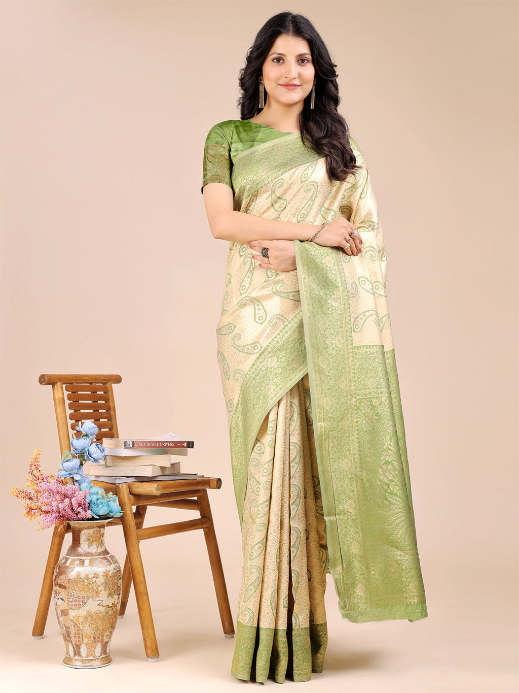 Cream and Light Green Banarasi Silk Saree featuring traditional zari work and stylish tassels.