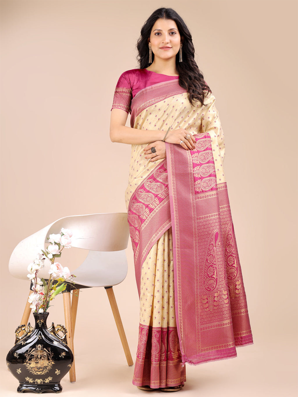 Elegant Cream and Magenta Banarasi Silk Saree featuring traditional zari motifs and decorative tassels.