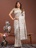 Neutral beige linen cotton saree with fine tribal and geometric woven patterns