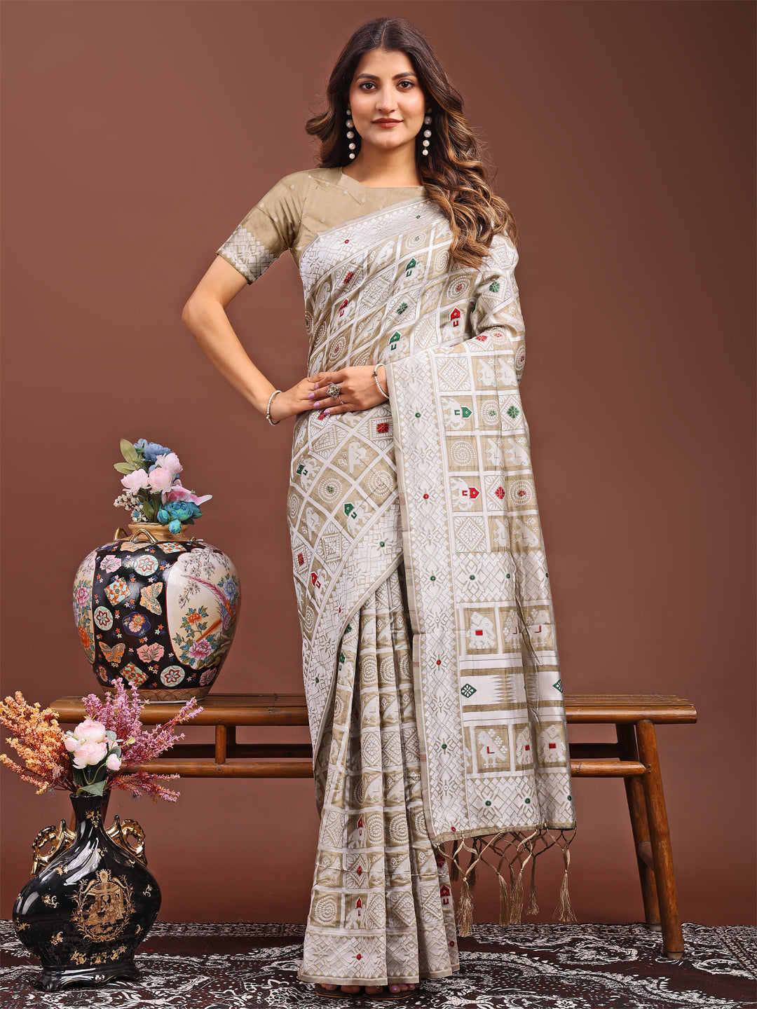 Neutral beige linen cotton saree with fine tribal and geometric woven patterns
