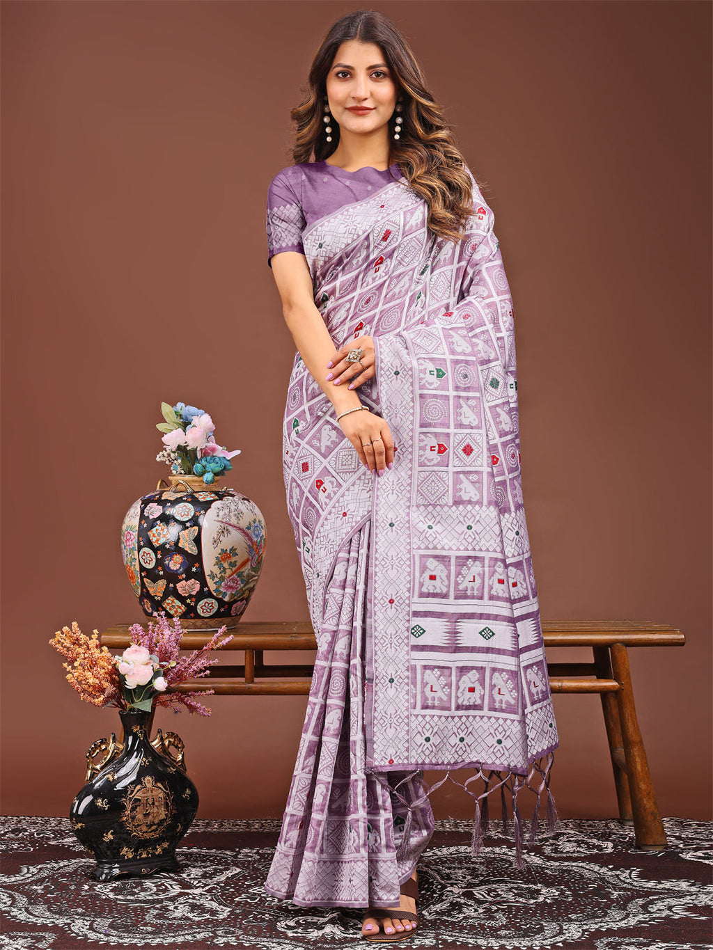 Purple linen cotton saree featuring traditional tribal and geometric woven motifs