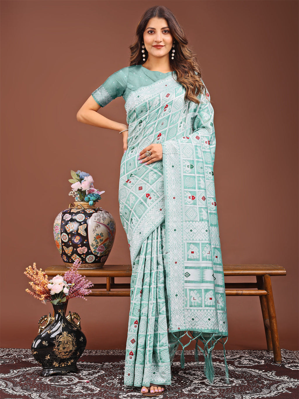 Sea green linen cotton saree with detailed geometric and tribal woven patterns