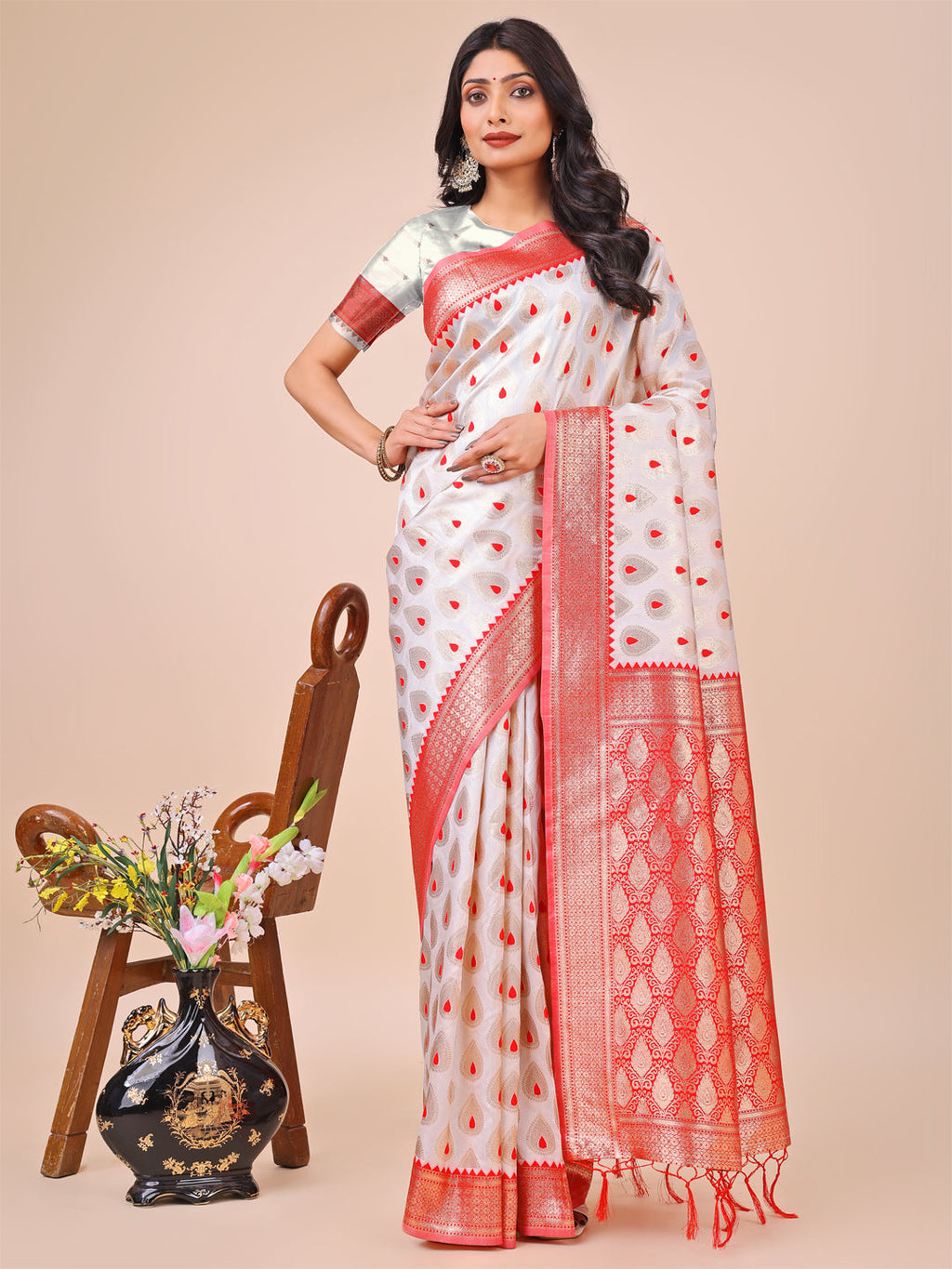 White and red Banarasi silk saree with detailed teardrop weaving and gold zari pallu