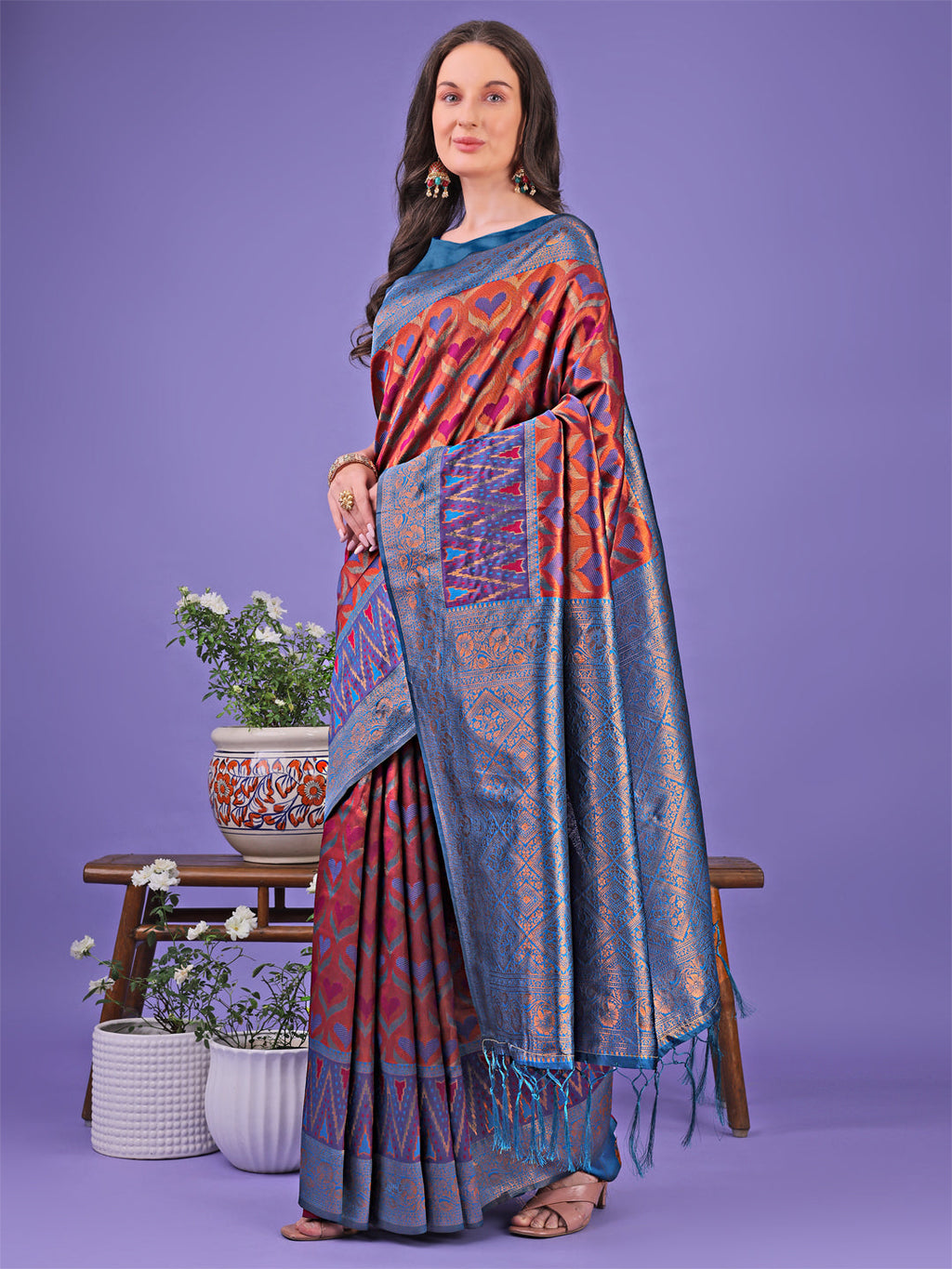 Radiant Lichi Silk Saree with Geometric Patterns in Deep-Red Teal-Blue