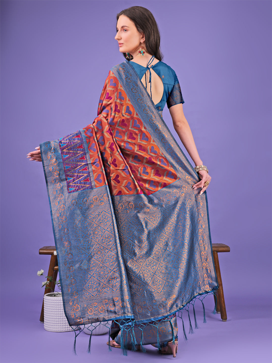 Radiant Lichi Silk Saree with Geometric Patterns in Deep-Red Teal-Blue