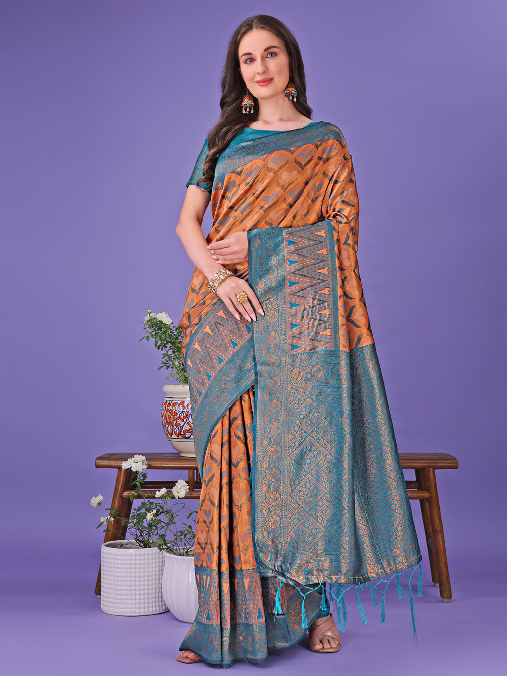 A luxurious radiant Lichi Silk Saree featuring traditional zari artistry and a glossy, smooth finish.