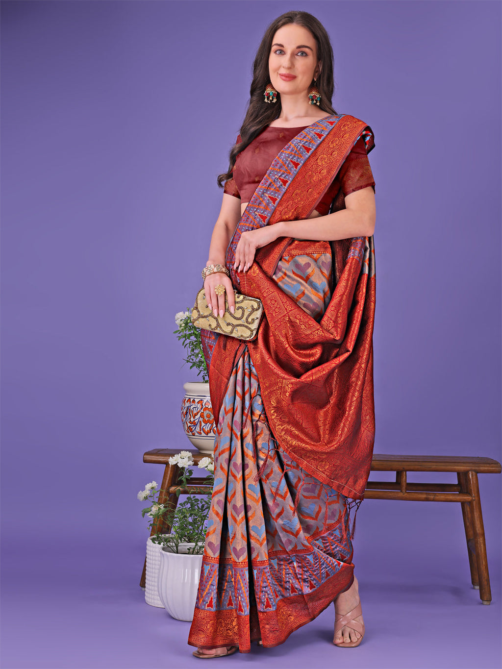 Radiant Lichi Silk Saree in Maroon and Blue with Geometric Gold Print