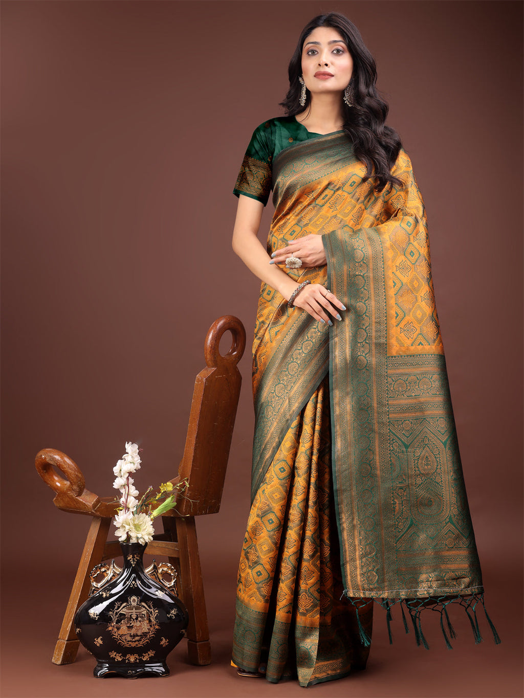 Green and Yellow silk saree with ornate woven pallu