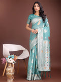 Sea green linen cotton saree adorned with refined zari border and woven motifs.