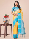 Dual-tone yellow silk saree with a rich woven border and intricate paisley pallu