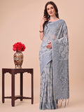 Beige and grey Banarasi cotton saree featuring intricate floral zari work and traditional pallu