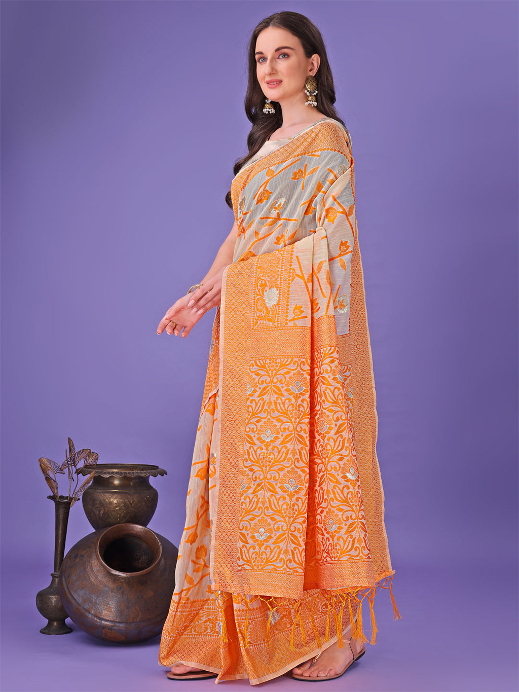 Orange Lichi Silk Saree with Floral Weaving and Tassel Pallu