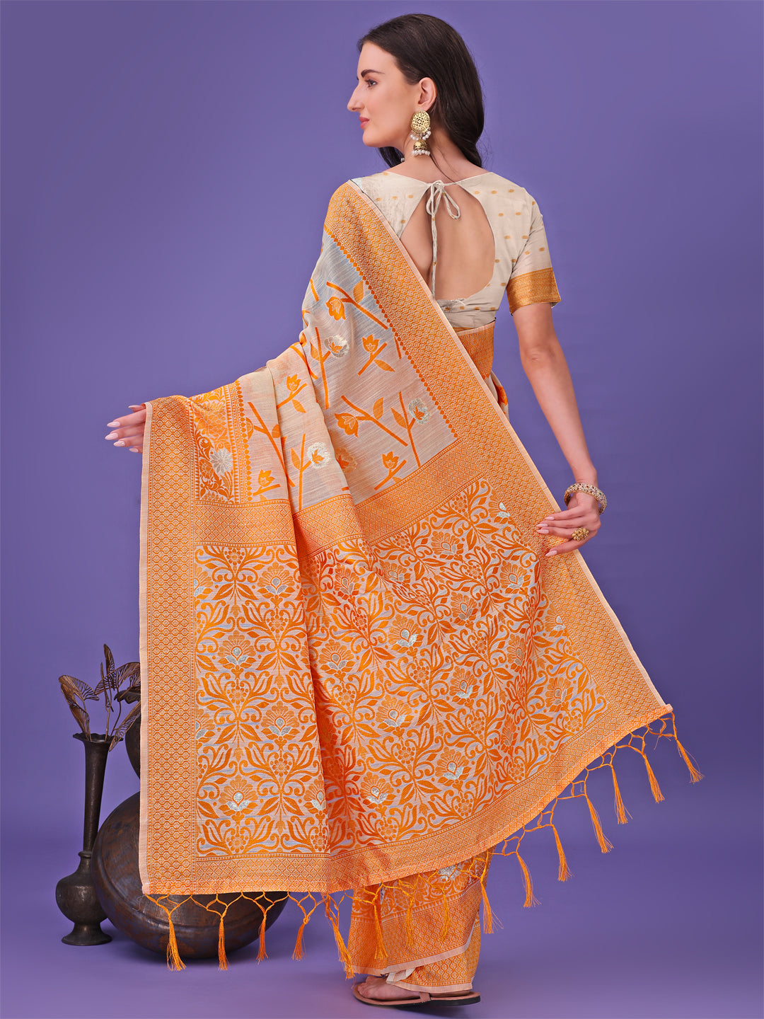 Orange Lichi Silk Saree with Floral Weaving and Tassel Pallu