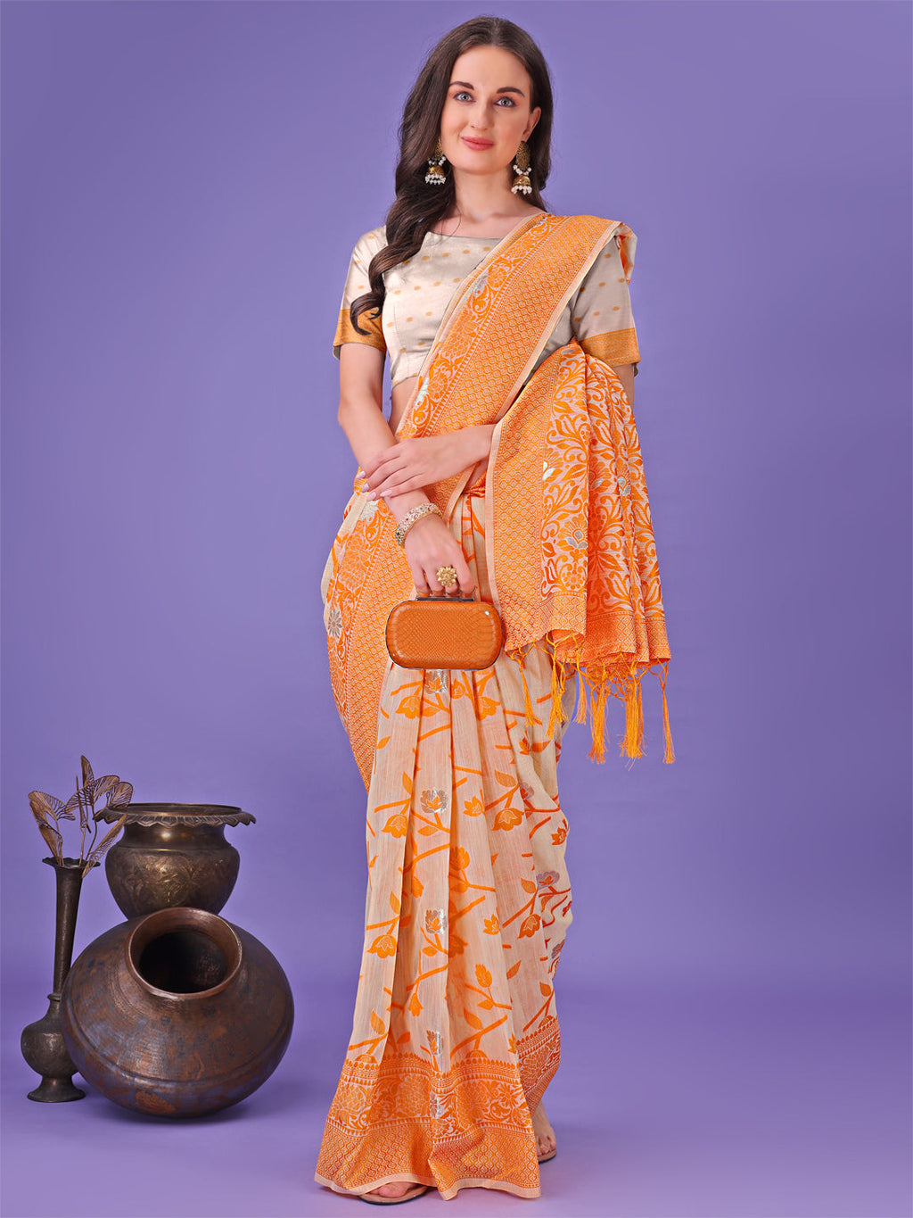 Orange Lichi Silk Saree with Floral Weaving and Tassel Pallu