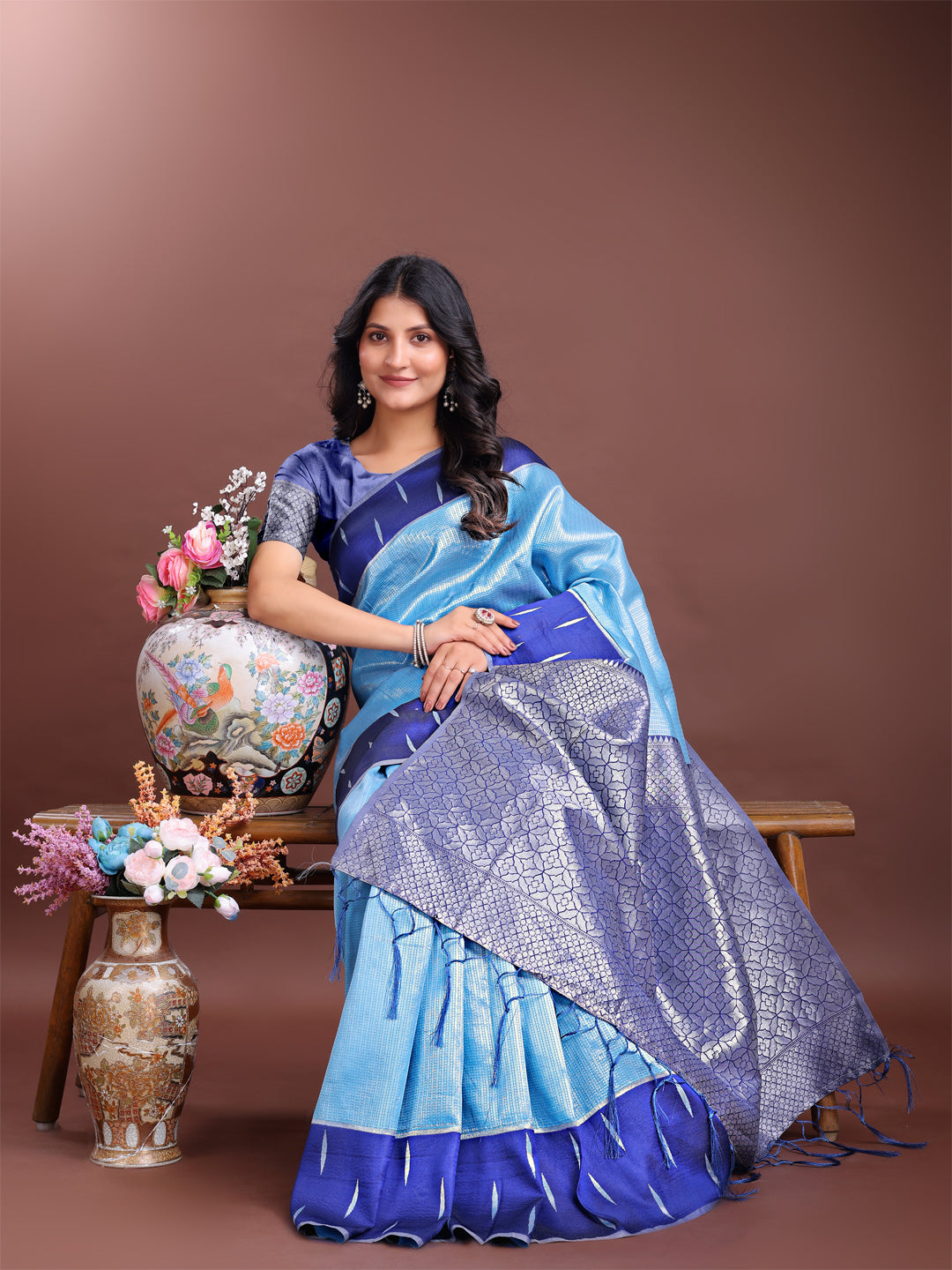 Sky Blue Lichi Silk Saree with Woven Zari and Tassel Details