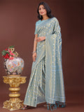 Elegant sky blue linen saree with silver zari butta and woven pallu