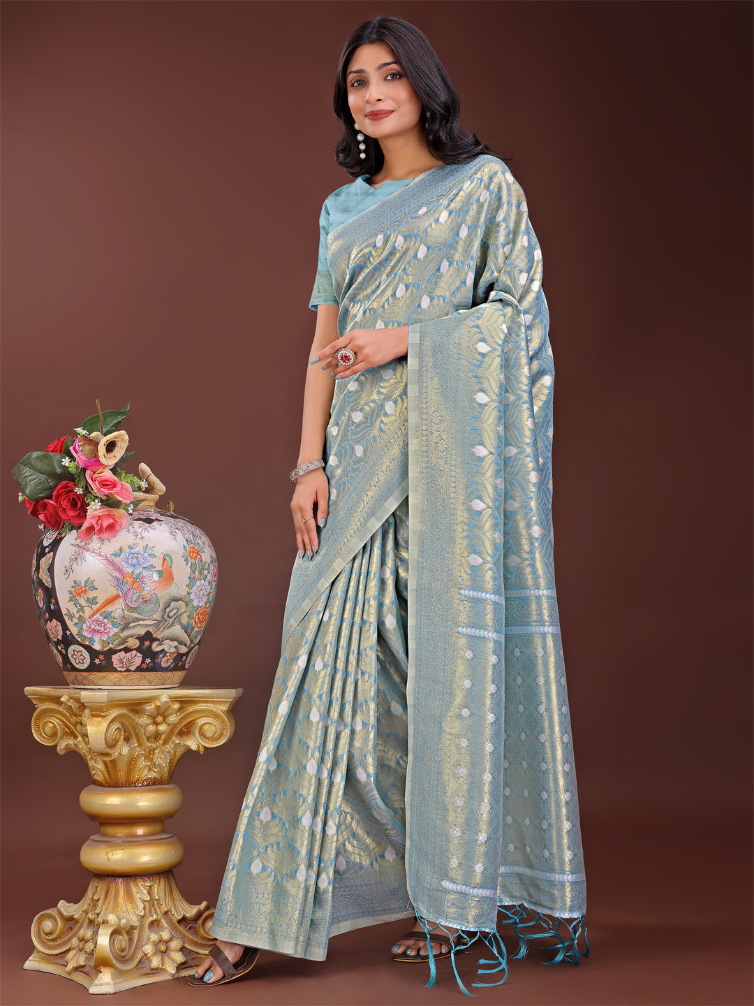 Elegant sky blue linen saree with silver zari butta and woven pallu