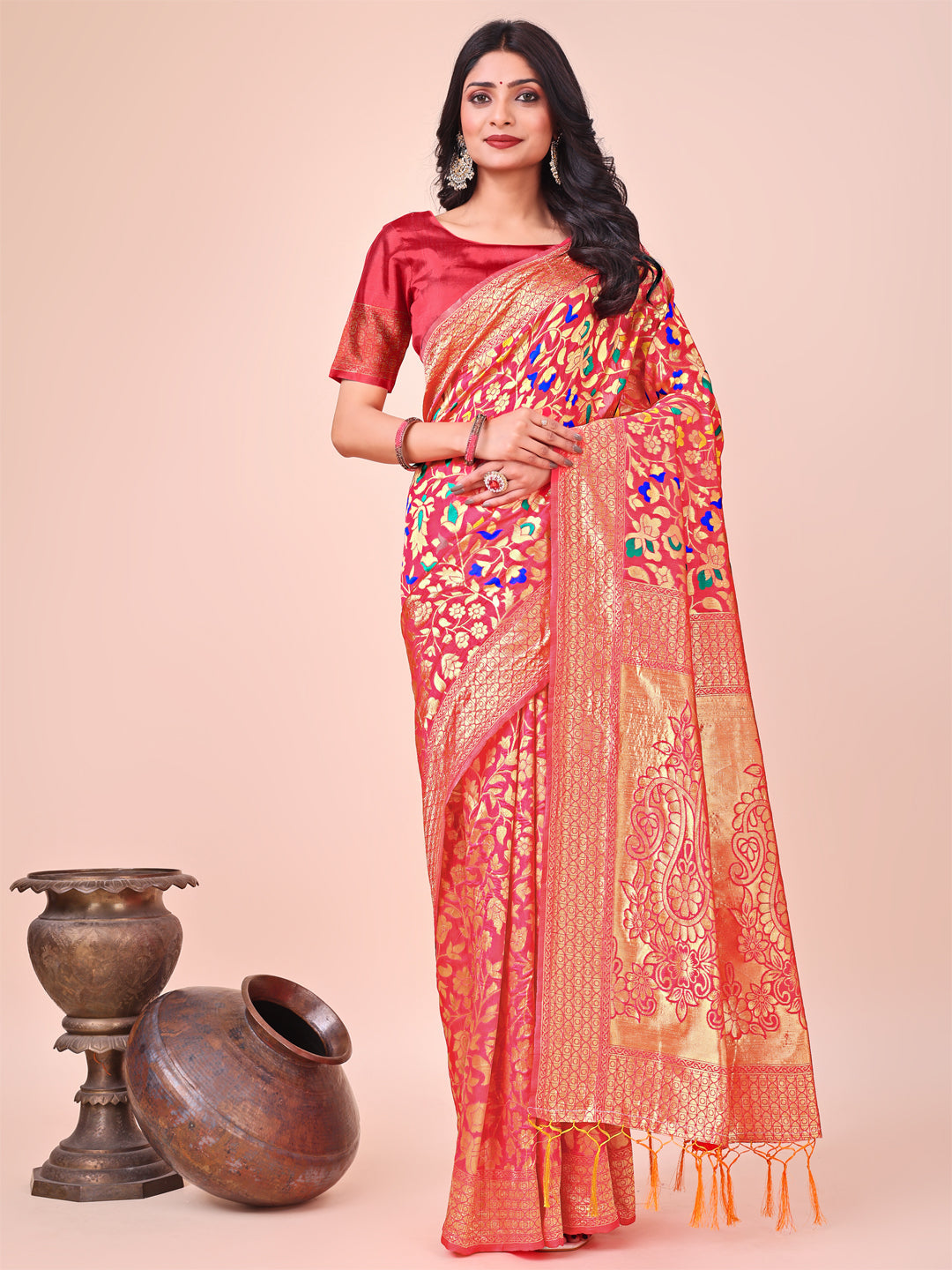 Majestic Maroon silk saree featuring rich gold zari work and floral designs