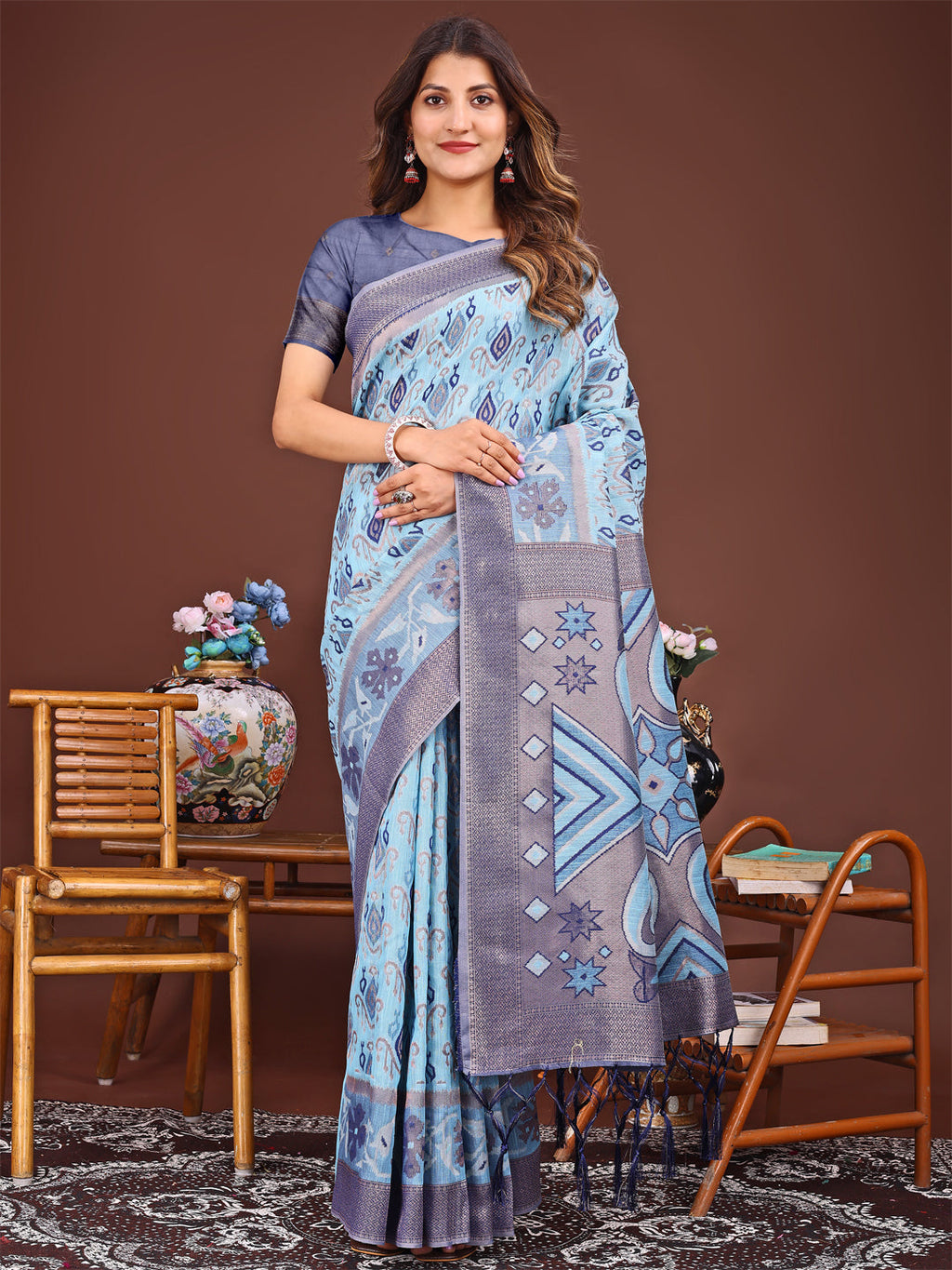Sky blue Patola style linen cotton saree with intricate woven details