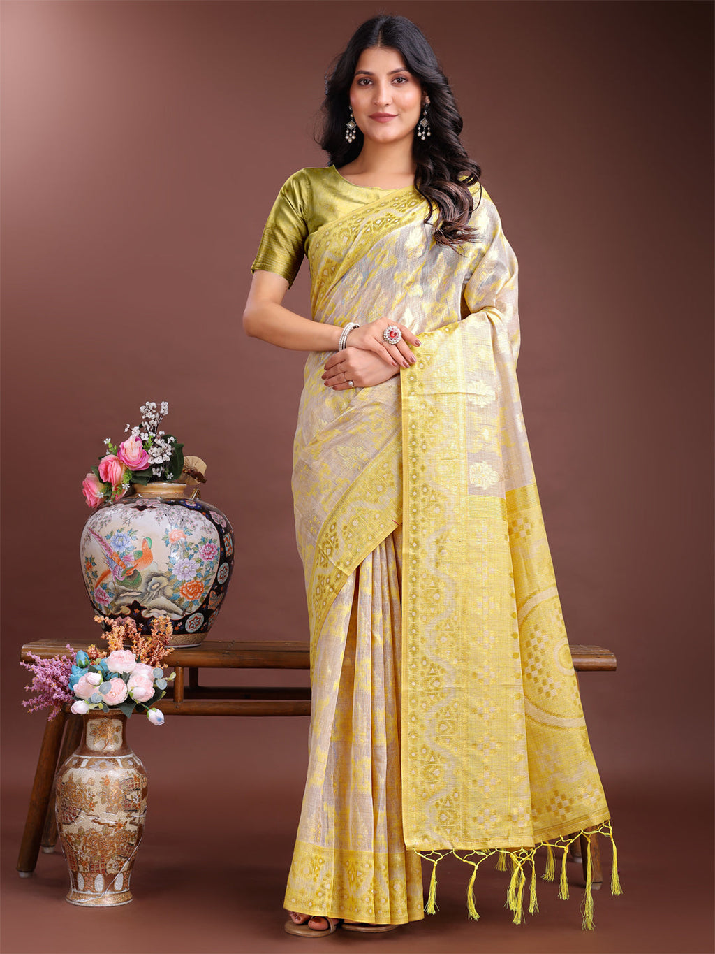 Beige and Yellow linen cotton saree with woven patterns and a vibrant pallu