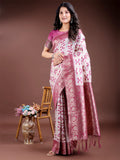 Deep purple linen cotton saree accented with ornate gold Zari work and matching tassels.