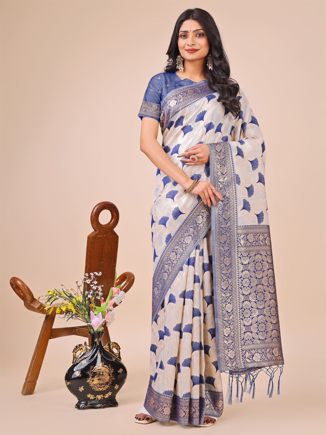 Off-white and blue linen cotton saree with zari border and blue woven motifs