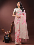 Beige and coral linen saree with abstract patterns and a zari border