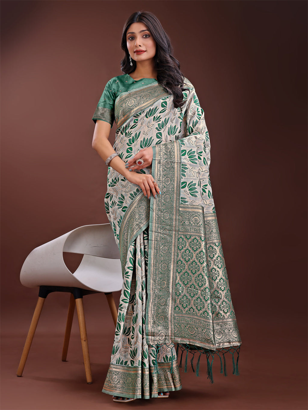 Beige and green linen saree with floral print and zari border