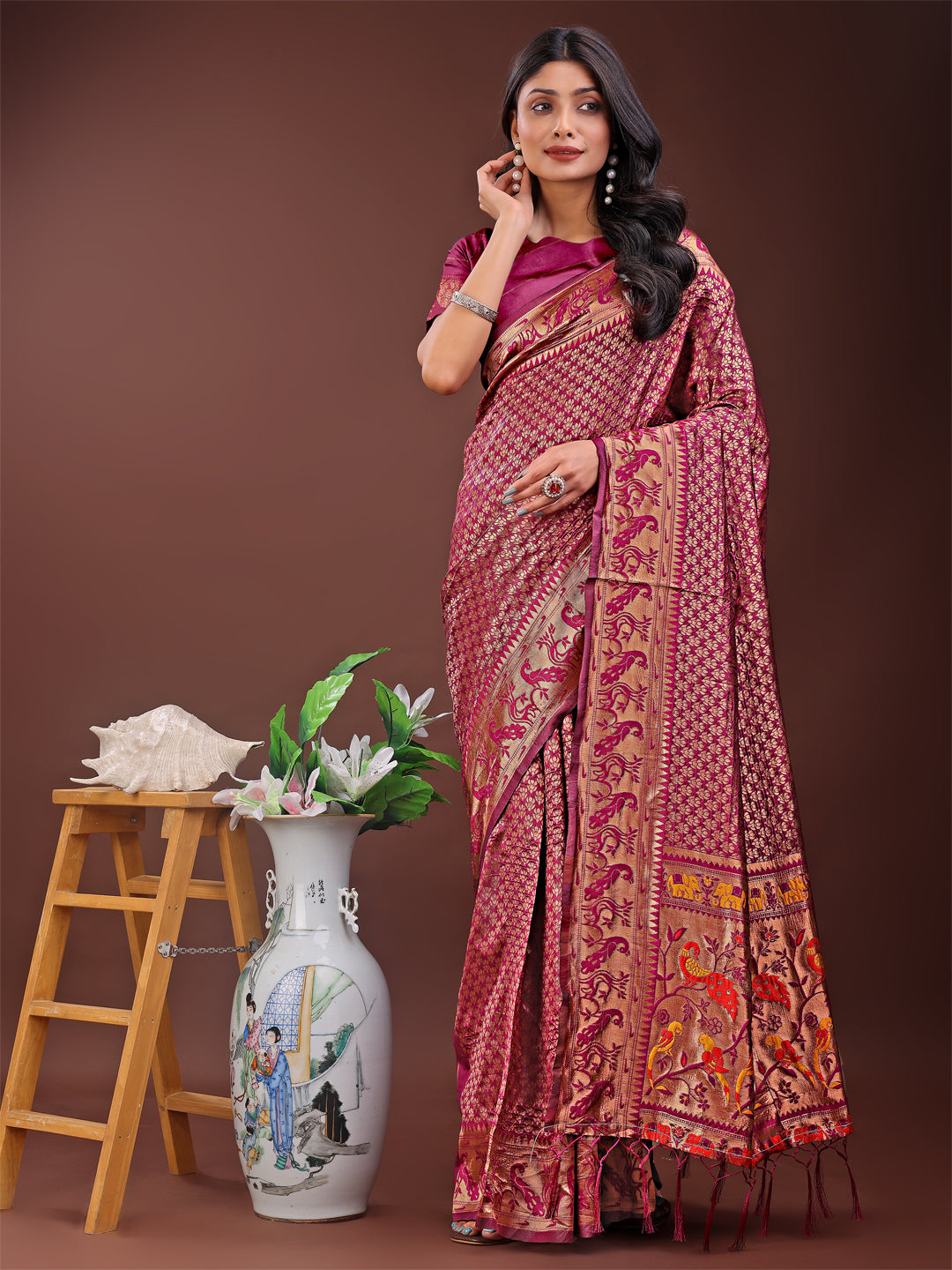 Fiery purple Banarasi silk saree featuring gold zari work and a multi-colored pallu
